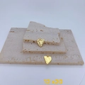 Detailed view of two gold heart pendants with hammered texture and engraved lettering - Textured Heart Style (#6 Pendant Only (Without Chain))
