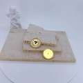 Detail of round gold-plated heart eye pendants with zircons and smooth back side - Black Pendant Only (Without Chain)