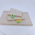 Macro view of gold-plated evil eye charms with neon green enamel and blue zircon stones - Neon Green Eye Shape / Pendant Only (Without Chain)