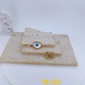Macro detail of heart evil eye charms with shell inlay and 19x20mm size scale - Heart Shell Style (#1)