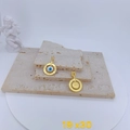 Detailed macro view of gold-plated Evil Eye charms with LOVE engraving and zircons - Round With LOVE Engraving Style