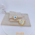 Detailed macro view of heart-shaped gold-plated shell charms with blue devil eye inlays - Large Heart Shell Style (#7)