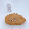 Silver-plated lobster clasp with micro-set zircons on a wooden slice background - Silver with White Zircon