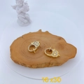 Detail of micro-pave zircon heart lobster clasp in gold finish on wood slice, 16x30mm - 1.6x3.0cm / Gold Heart Style (#4)