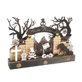 Wooden Halloween decoration featuring cutout skull, pumpkin and spooky haunted house scenery - Haunted Graveyard