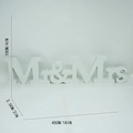 White wooden Mr & Mrs wedding decor sign showing height 10cm and length 45cm dimensions - White