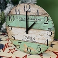 Retro round wall clock with multi-color wood grain panel and vintage French text - Round Style / Round Paris