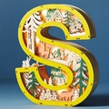 Close-up of wooden letter S LED light with 3D forest scene and warm glow effect - Letter S