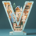 Macro detail of V-shaped wooden LED light with intricate cutout winter snow scene - Letter V