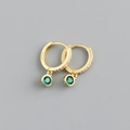 Detailed macro view of S925 sterling silver gold earrings with round emerald pendants - Green Zirconia (Gold Base)