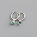 Close-up of 925 sterling silver hoop earrings with green gemstone and micro zircon pave - Green Zirconia (Platinum Base)