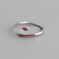 Close-up of adjustable silver ring featuring marquise-cut and round red zircon stones - Adjustable Open / Red Stone Platinum