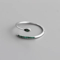 Macro detail of S925 silver snake ring featuring marquise green zircon and side stones - Adjustable Open / Green Stone Platinum