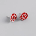 Close-up of red melting smiley face earrings with vibrant dripping oil enamel finish - 925 Silver / Red (Platinum)