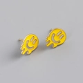 Detailed close-up of yellow melting smiley face stud earrings with gold plating - 925 Silver / Yellow (Gold)