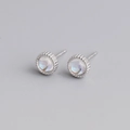 Detailed macro shot of S925 sterling silver studs with iridescent moonstone cabochons - White Gold