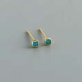 Detail of square gold stud earrings featuring vibrant turquoise stones in a minimalist design - Style F (Gold)