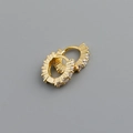 Macro shot of gold huggie earrings with clear cubic zirconia in a sunburst setting - 925 Silver / White Zircon (Gold Color)
