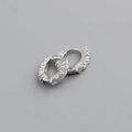 Macro shot of silver S925 sterling silver hoop earrings with clear cubic zirconia stones - 925 Silver / White Zirconia (Silver Tone)
