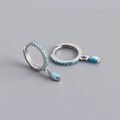 Macro view of S925 silver hoop earrings featuring turquoise stones and marquise pendants - 925 Silver / Turquoise (Platinum Plated)