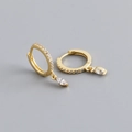 Close-up of golden hoop earrings with marquise cut stones and pave set crystals - 925 Silver / Clear White (Gold)