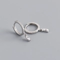 Macro view of S925 sterling silver hoop earrings with marquise-cut marquise stones - 925 Silver / Clear White (Silver)