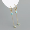 Detailed macro view of S925 sterling silver tassel earrings with green zircon stones - 925 Silver / Turquoise Color (Gold)