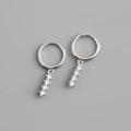 Close-up of S925 sterling silver hoop earrings with four dangling clear cubic zirconia - 925 Silver / White Zircon (Platinum Color)