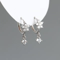 Macro view of S925 sterling silver plum flower earrings with cubic zirconia stones - White (Silver)