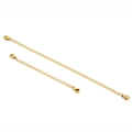 Detail of golden stainless steel extension chains with dual lobster clasps in two lengths - Short (5cm) / Gold