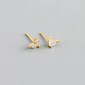 Macro shot of V-shaped marquise-cut zircon stud earrings in gold-plated silver - White (Gold)