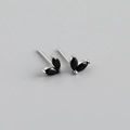 Detailed macro view of S925 silver stud earrings with black marquise-cut gemstones - Black (Silver)