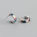 Close-up of C-shaped silver earrings with rainbow rectangular zircon stones - Mixed Multicolor Zircon (Platinum)