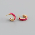 Detail of C-shaped gold hoop earrings with emerald-cut red zircon stones and studs - Red Zircon (Gold)