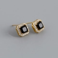 Macro detail of square halo stud earrings featuring black zircon and gold plating finish - Black Zirconia (Gold)
