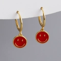 Detailed macro shot of S925 sterling silver earrings with red enamel smiley face charms - Red Zirconia (Gold)