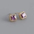 Macro shot of gold square stud earrings with purple zircon and white diamond halo - Amethyst Purple (Gold)
