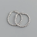 Close-up of S925 sterling silver hoop earrings with textured oval bead pattern detail - Large (Platinum)