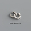 Macro shot of minimalist S925 silver hoop earring showing 6mm internal diameter size - Inner Diameter 6mm / White Gold