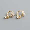 Macro shot of gold butterfly huggie earrings with sparkling clear zircon stones - Clear White (Gold)