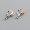 Detail view of S925 sterling silver butterfly earrings with champagne zircon stones - Yellow Stone (Platinum)
