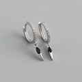 Macro detail of silver hoop earrings with black marquise stone and zircon pavé - 925 Silver / Black Zircon (White Gold Color)