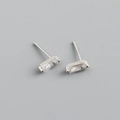 Detailed macro shot of rectangular zircon stud earrings with S925 silver hallmarks - 925 Silver / Clear White (Silver)