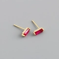 Detailed macro view of S925 sterling silver stamp on golden red zircon stud earrings - 925 Silver / Ruby Red (Gold)