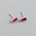 Close-up of minimalist S925 silver stud earrings with rectangle red zircon inlay - 925 Silver / Ruby Red (Silver)