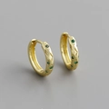 Macro view of gold S925 silver hoop earrings featuring green zircon stones and brushed texture - Gold (Green Stone)
