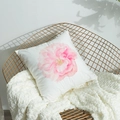 White square cushion cover with pink floral print and gold foil on metal chair - Flower