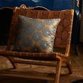 Navy blue and gold jacquard pillow cover with embossed patterns on luxury woven chair - Blue