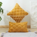 Ginger yellow plush pillow covers with geometric square pattern in a cozy home setting - Turmeric