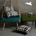 Modern houndstooth pillow covers in black white and brown on a luxury gold chair - White Coffee Houndstooth